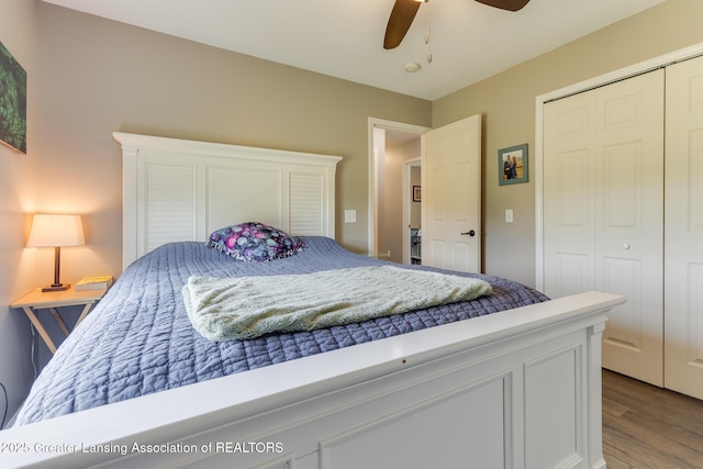 2520 Linn Rd, Williamston, MI 48895 - bedroom featuring wood finished floors, a closet, and a ceiling fan