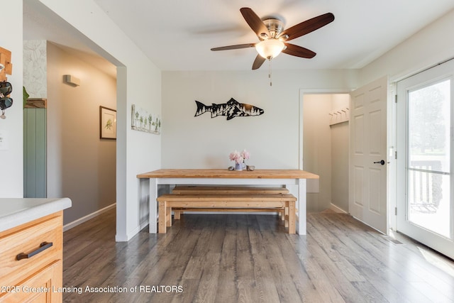 2520 Linn Rd, Williamston, MI 48895 - dining room with wood finished floors and ceiling fan