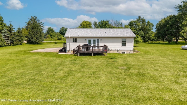 2520 Linn Rd, Williamston, MI 48895 - back of house with french doors, a deck, and a lawn