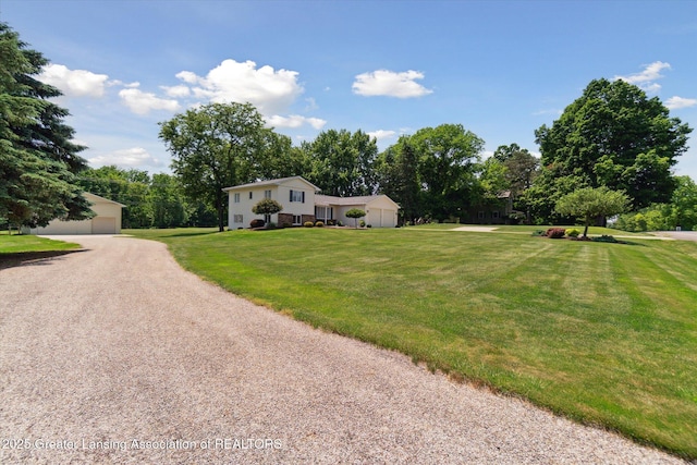 6252 N River Hwy, Grand Ledge, MI 48837 - view of front facade featuring a front yard