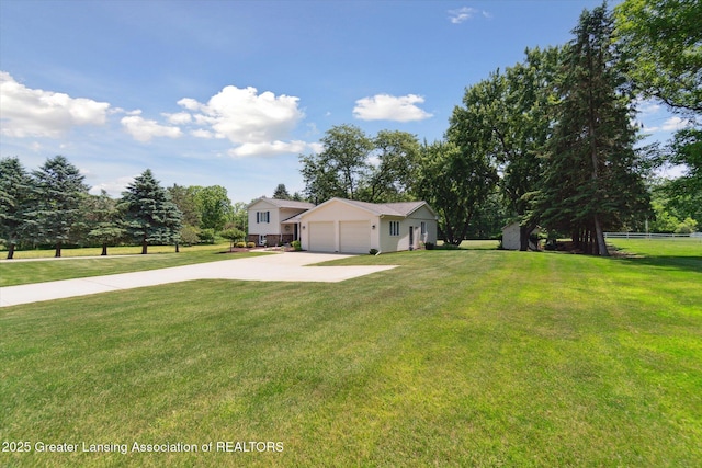 6252 N River Hwy, Grand Ledge, MI 48837 - view of grassy yard featuring driveway