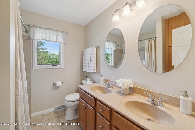 6252 N River Hwy, Grand Ledge, MI 48837 - bathroom featuring double vanity, tile patterned flooring, and a shower with shower curtain