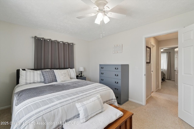 6252 N River Hwy, Grand Ledge, MI 48837 - bedroom with light carpet and a ceiling fan