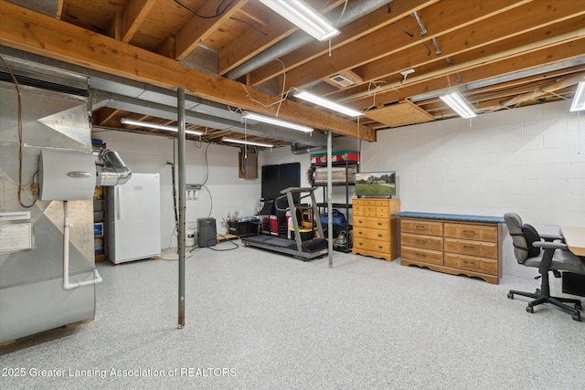6252 N River Hwy, Grand Ledge, MI 48837 - unfinished basement with freestanding refrigerator and concrete block wall
