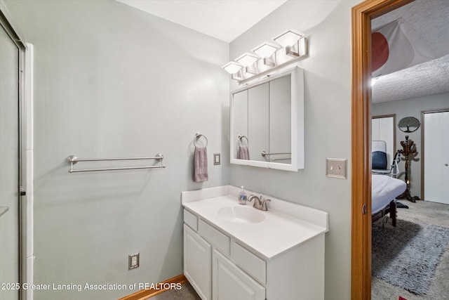 5041 E Willoughby Rd Unit 7, Holt, MI 48842 - bathroom with vanity and ensuite bath