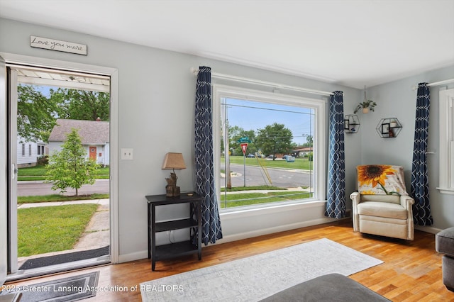 1424 Woodbine Ave, Lansing, MI 48910 - sitting room with wood finished floors