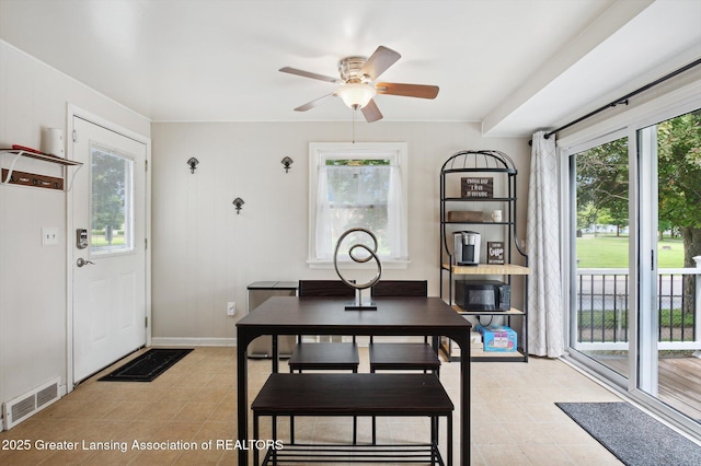 1424 Woodbine Ave, Lansing, MI 48910 - dining space featuring a ceiling fan and light tile patterned flooring