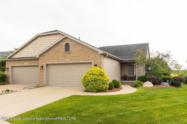 4001 Sierra Hts, Holt, MI 48842 - view of front facade with a garage, brick siding, a front yard, and concrete driveway