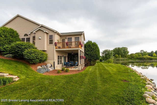 4001 Sierra Hts, Holt, MI 48842 - rear view of property featuring a water view, a yard, a patio, and a balcony