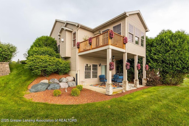 4001 Sierra Hts, Holt, MI 48842 - rear view of house featuring a balcony, a patio area, and a lawn