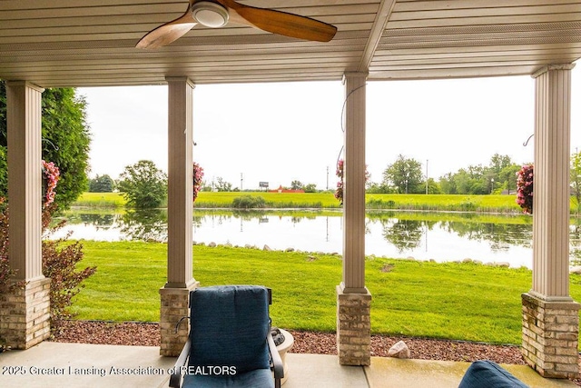 4001 Sierra Hts, Holt, MI 48842 - view of patio / terrace with a water view and a ceiling fan