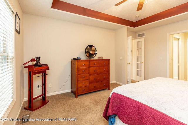 4001 Sierra Hts, Holt, MI 48842 - carpeted bedroom with multiple windows and ceiling fan
