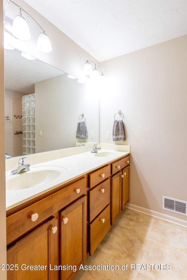 4001 Sierra Hts, Holt, MI 48842 - bathroom featuring double vanity and a shower with shower curtain