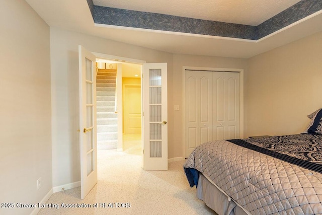 4001 Sierra Hts, Holt, MI 48842 - bedroom featuring french doors and a closet