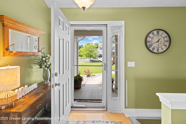 3913 Danbridge Dr, Lansing, MI 48906 - entrance foyer featuring baseboards and wood finished floors