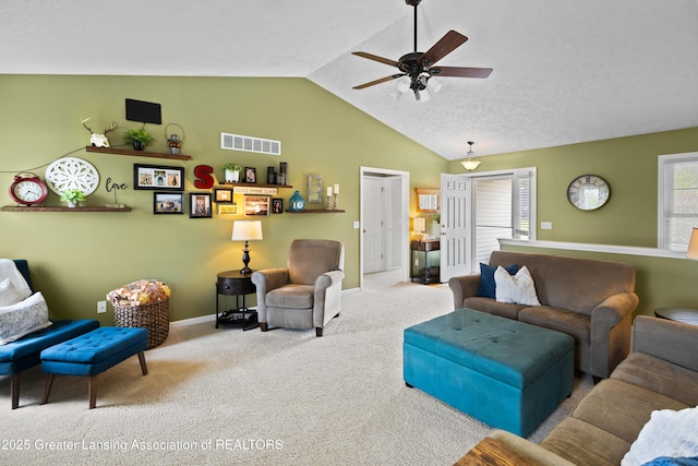 3913 Danbridge Dr, Lansing, MI 48906 - living room featuring carpet floors, ceiling fan, and lofted ceiling