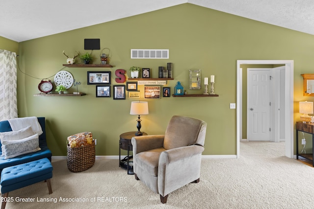 3913 Danbridge Dr, Lansing, MI 48906 - living area featuring carpet and lofted ceiling