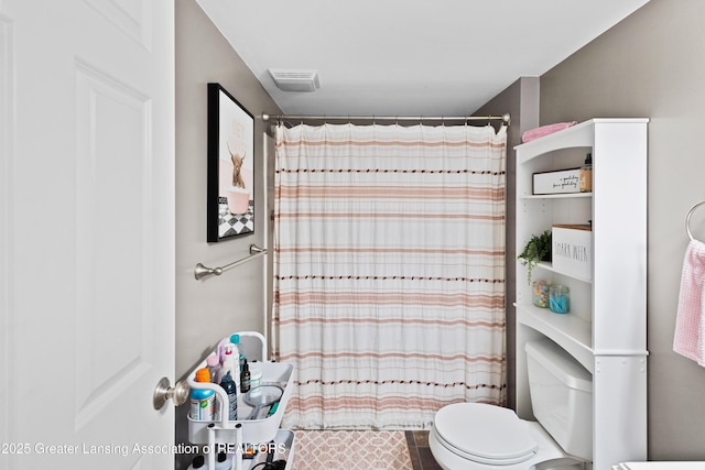 3913 Danbridge Dr, Lansing, MI 48906 - full bath featuring a shower with shower curtain