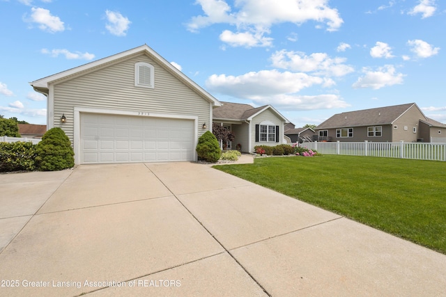 3913 Danbridge Dr, Lansing, MI 48906 - ranch-style home featuring driveway and an attached garage