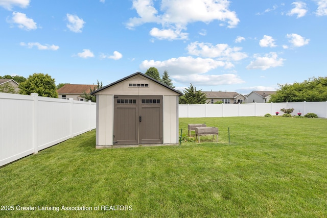 3913 Danbridge Dr, Lansing, MI 48906 - view of shed with a fenced backyard