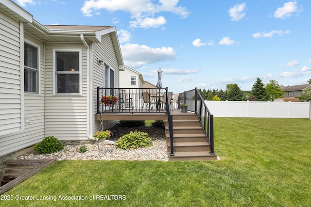 3913 Danbridge Dr, Lansing, MI 48906 - view of yard with a wooden deck and stairs