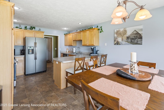 3913 Danbridge Dr, Lansing, MI 48906 - dining room with a textured ceiling and recessed lighting