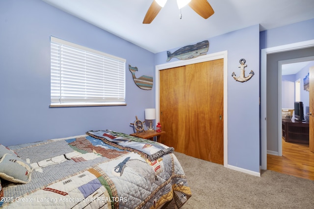425 S Holmes St, Lansing, MI 48912 - carpeted bedroom featuring a closet and ceiling fan
