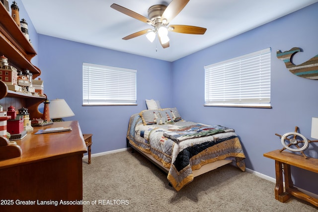 425 S Holmes St, Lansing, MI 48912 - bedroom with carpet, a ceiling fan, and an office area