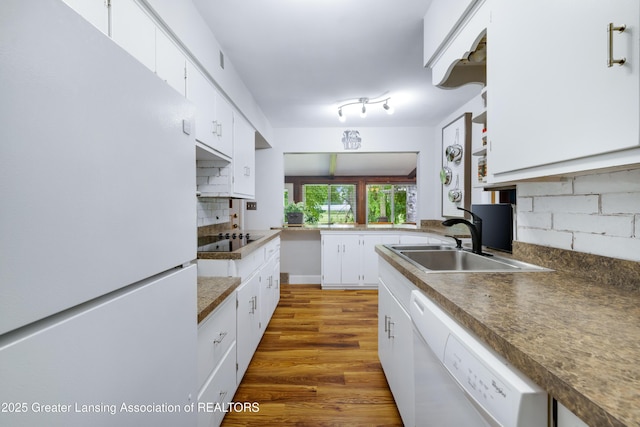 425 S Holmes St, Lansing, MI 48912 - kitchen featuring white appliances, tasteful backsplash, white cabinetry, wood finished floors, and open shelves