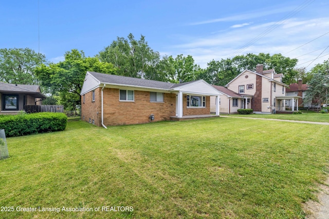 425 S Holmes St, Lansing, MI 48912 - view of front of home with brick siding