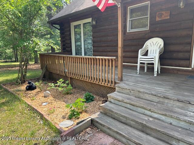 10886 SE Gillow Rd, Fife Lake, MI 49633 - view of wooden terrace