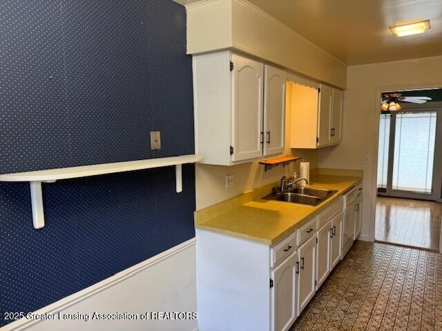 6211 Cobblers Dr, East Lansing, MI 48823 - kitchen with white cabinets and light countertops