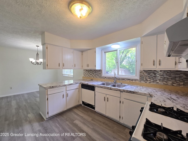 3116 Colchester Rd, Lansing, MI 48906 - kitchen with range hood, white appliances, a textured ceiling, white cabinets, and wood finished floors