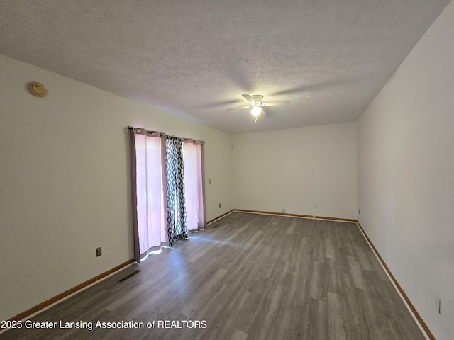3116 Colchester Rd, Lansing, MI 48906 - empty room featuring wood finished floors, ceiling fan, a textured ceiling, and a smoke detector