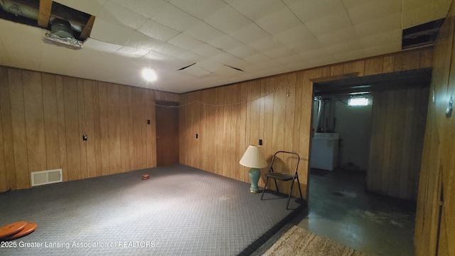 3116 Colchester Rd, Lansing, MI 48906 - finished basement with wood walls and washer / clothes dryer