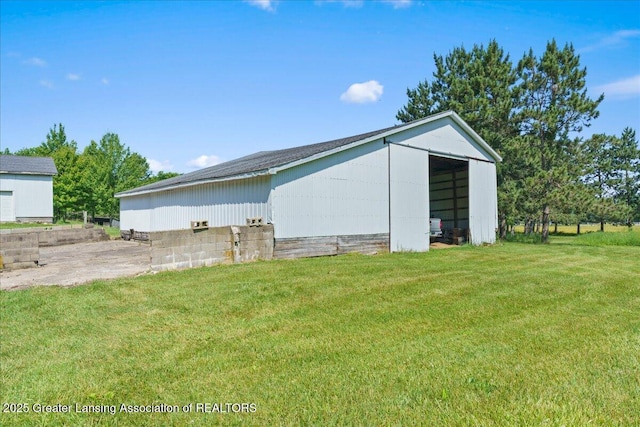 1754 S College Rd, Mason, MI 48854 - view of pole building with a lawn