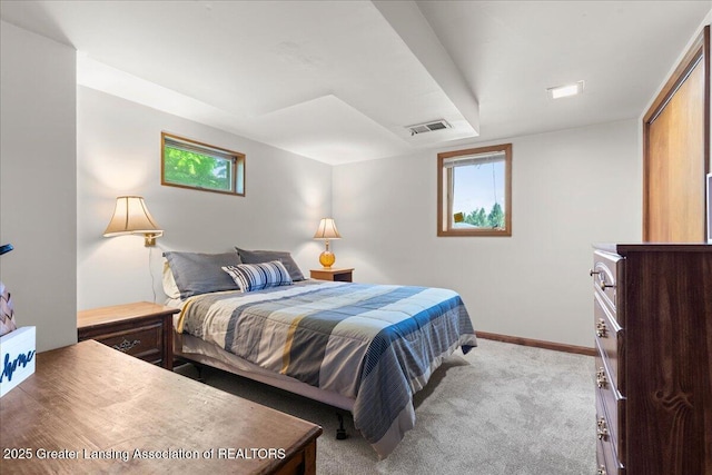 1754 S College Rd, Mason, MI 48854 - bedroom with light carpet and baseboards