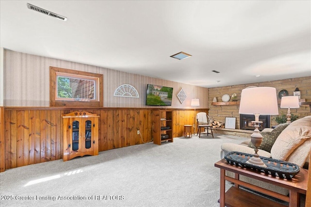 1754 S College Rd, Mason, MI 48854 - carpeted living room with wood walls