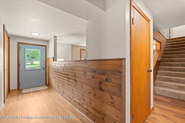 1754 S College Rd, Mason, MI 48854 - hallway with light wood-style flooring and stairs