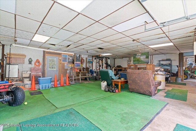 1754 S College Rd, Mason, MI 48854 - miscellaneous room with a drop ceiling and concrete floors