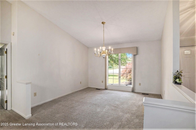 5800 Bent Tree Dr, East Lansing, MI 48823 - carpeted empty room with lofted ceiling and a chandelier
