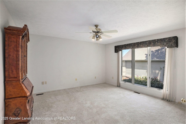 5800 Bent Tree Dr, East Lansing, MI 48823 - carpeted empty room with ceiling fan