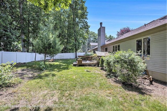 5800 Bent Tree Dr, East Lansing, MI 48823 - fenced backyard with a wooden deck