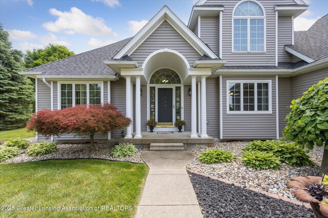 169 Mapleview Dr, Charlotte, MI 48813 - view of front of property with a shingled roof