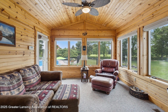 169 Mapleview Dr, Charlotte, MI 48813 - sunroom featuring lofted ceiling, wood walls, carpet, and wooden ceiling