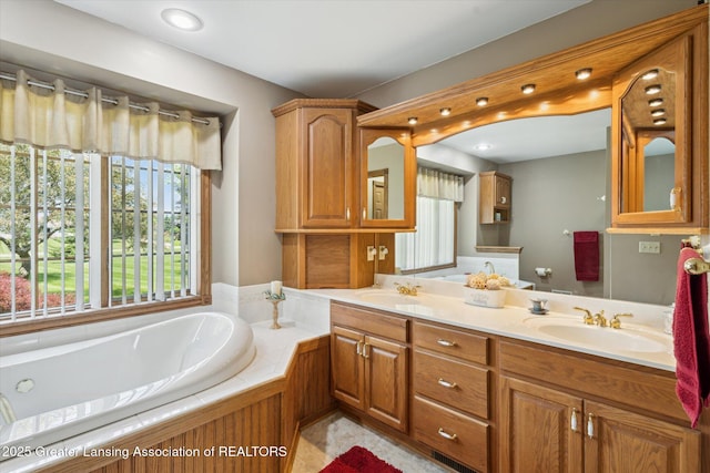 169 Mapleview Dr, Charlotte, MI 48813 - full bathroom with double vanity and a bath