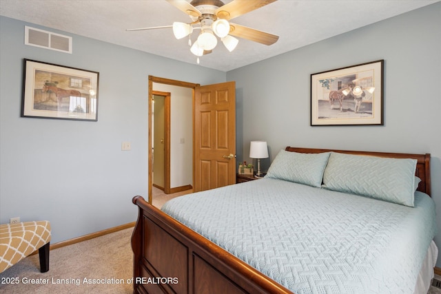 169 Mapleview Dr, Charlotte, MI 48813 - bedroom with light carpet and a ceiling fan