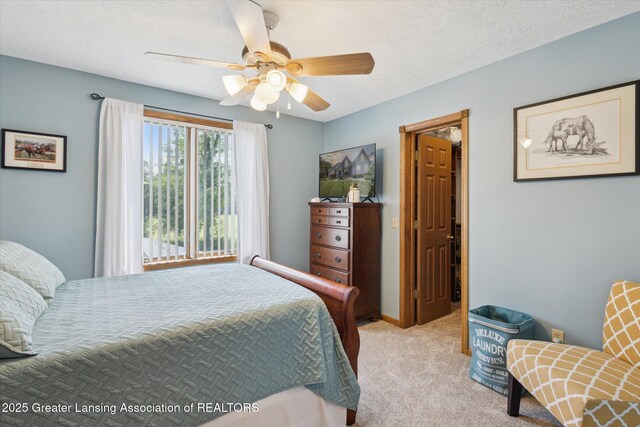 169 Mapleview Dr, Charlotte, MI 48813 - carpeted bedroom with a ceiling fan