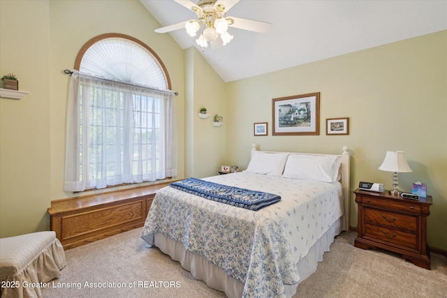 169 Mapleview Dr, Charlotte, MI 48813 - bedroom with light carpet, vaulted ceiling, and ceiling fan