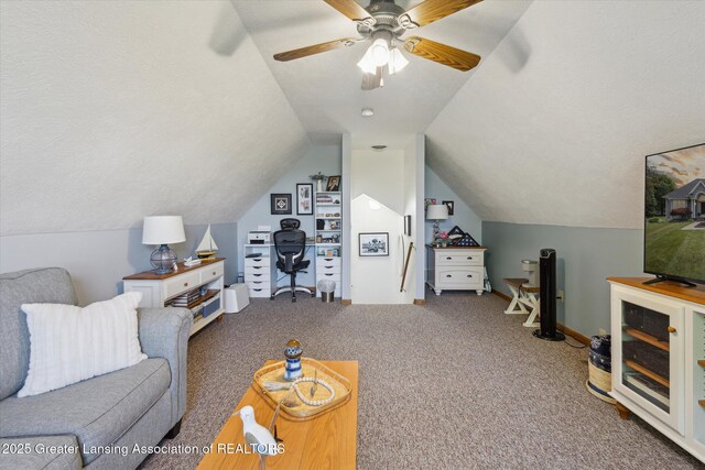 169 Mapleview Dr, Charlotte, MI 48813 - living area featuring carpet floors, vaulted ceiling, and ceiling fan